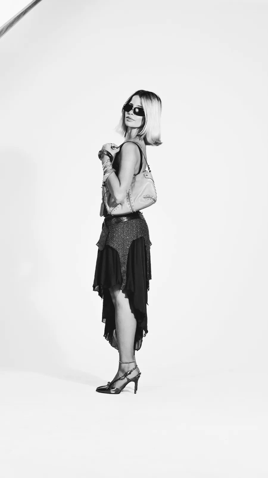 Jaylin Pinasco, full-length black-and-white portrait