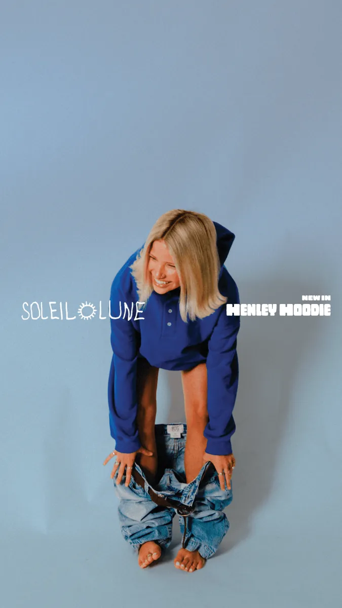 Video ad, model smiling full-length